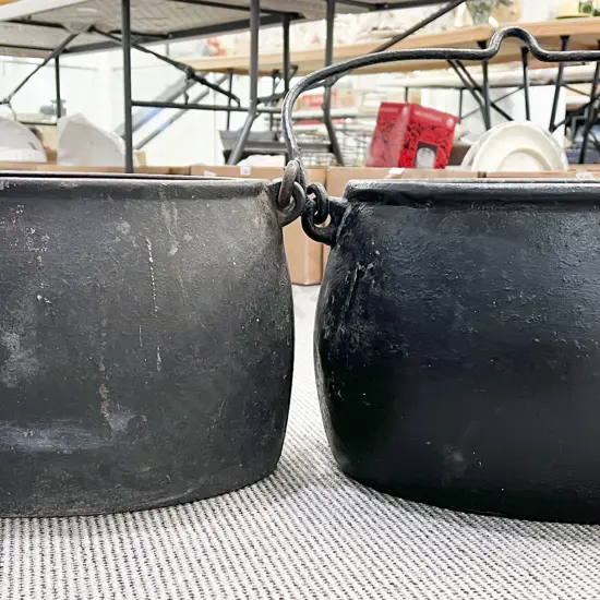 Two Wrought Metal Oval Cauldrons
