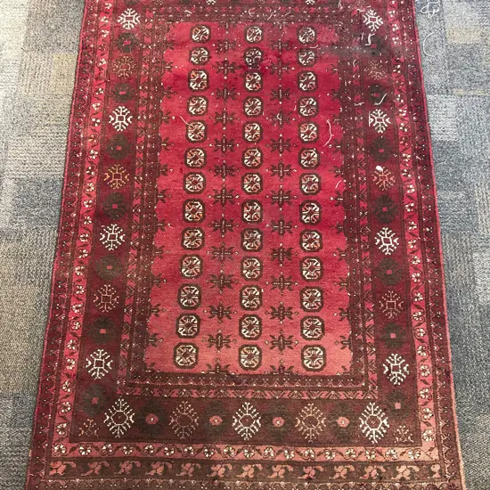 Persian Floor Rug on Red Ground