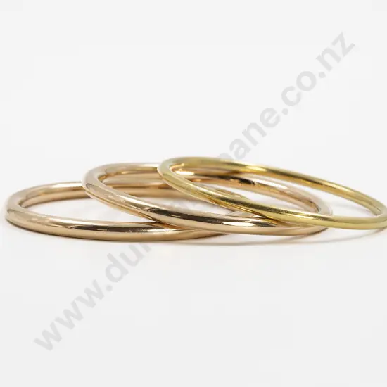 Three Heavy Rose and Yellow Gold Plated Bangles