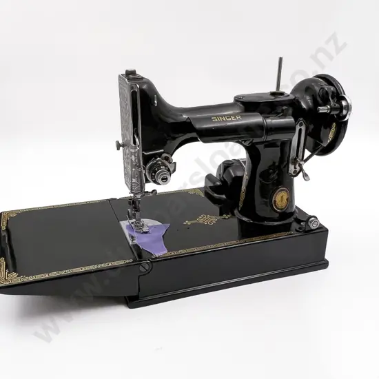 Cased Vintage Singer Sewing Machine and Accessories