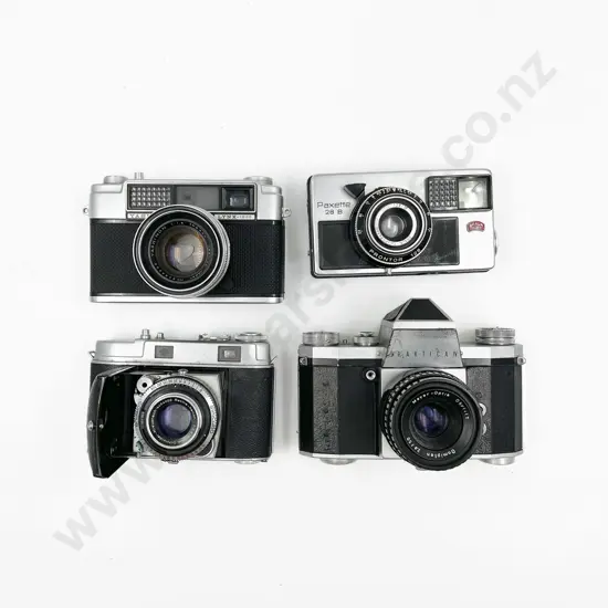 Three Various Cased Cameras with Praktica IV