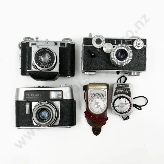 Three Cased Cameras with Two Light Meters