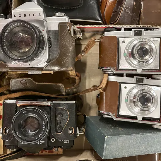 Four Cased Cameras Including Three Light Meters