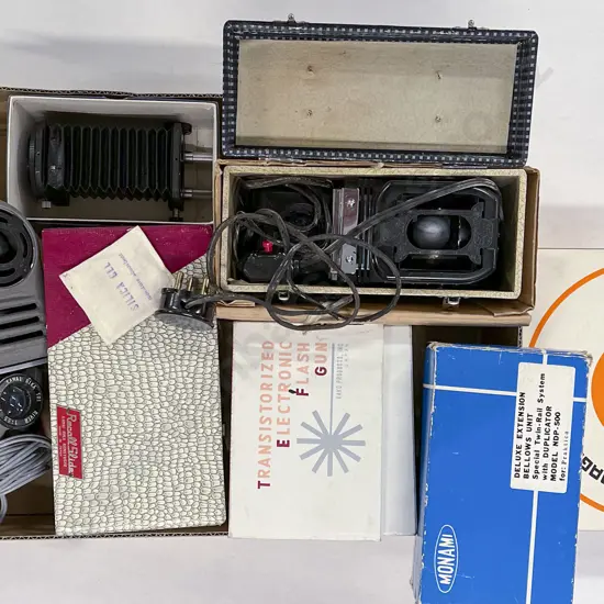 Assorted Quantity of Camera Accessories with Projector