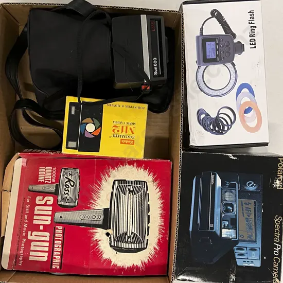 Assorted Quantity of Camera Accessories with Polaroids