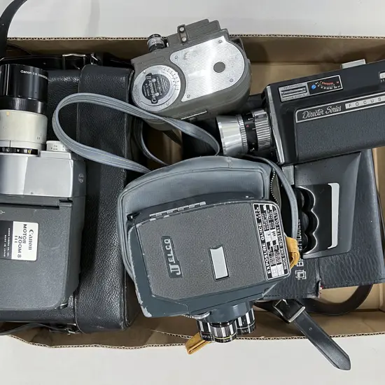 Three Cased Movie Cameras with Cinemaster II Model G-8