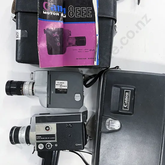 Two Cased Movie Cameras
