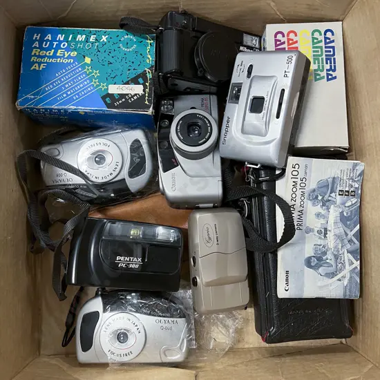 Quantity of Assorted Pocket Cameras