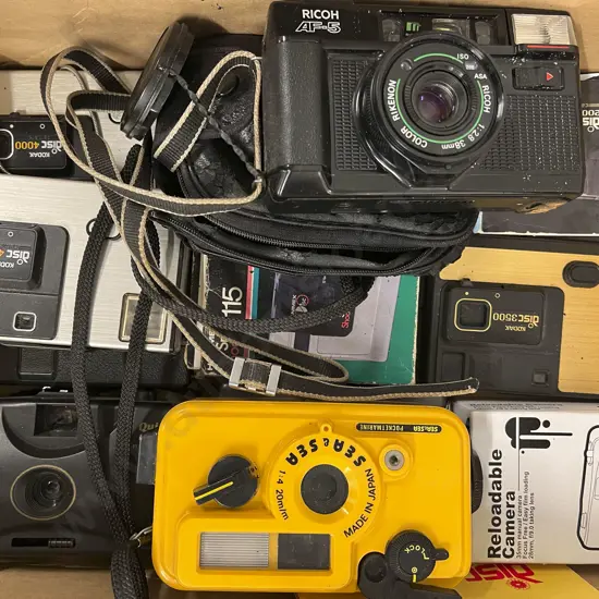 Quantity of Assorted Pocket Cameras