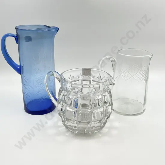 Three Assorted Glass Jugs