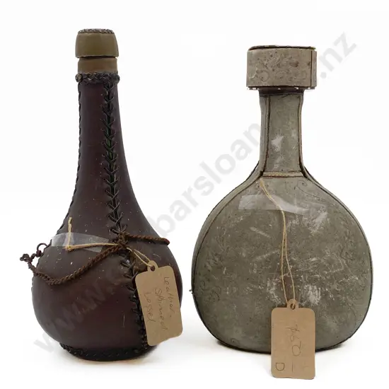 Two Leather Skinned Bottles