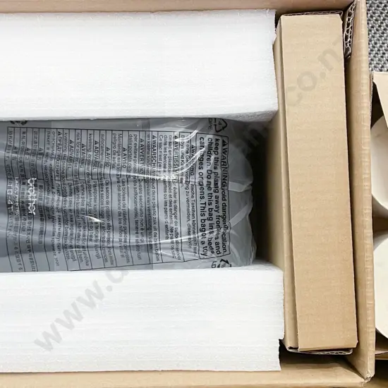 Brother Label Printer Together with Roll of Labels