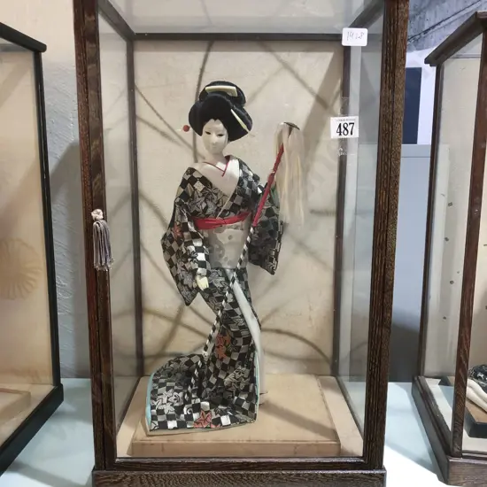 Japanese Doll In Glass