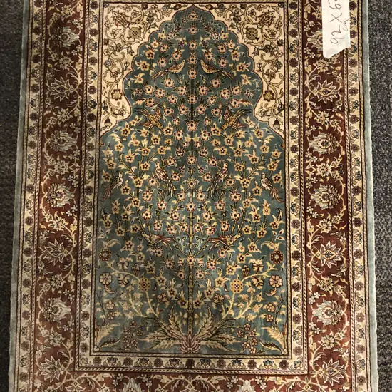 Small Silk Persian Rug with Floral and Bird Motifs