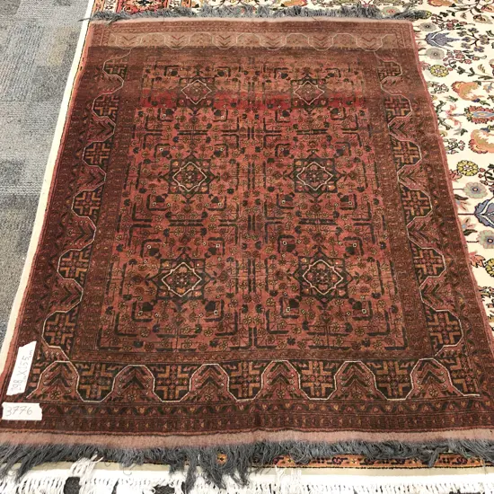 Persian Floor Rug on Rust Coloured Ground