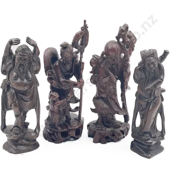 Four Carved Figures