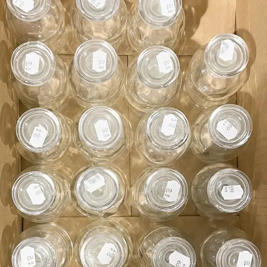 Twenty Four Small Lidded Chemist Bottles