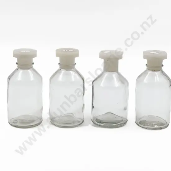 Four Assorted Vintage Chemist Bottles