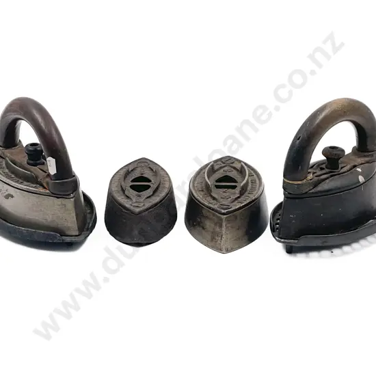 Four Assorted Flat Irons and Two Trivets