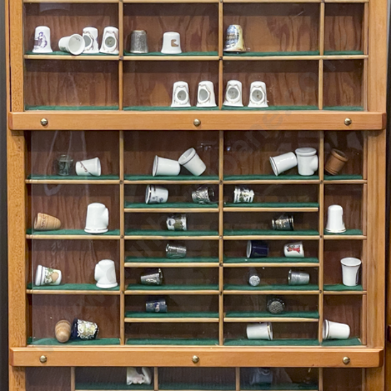 Three Panel Glazed Knick Knack Cabinet with Assorted Thimbles