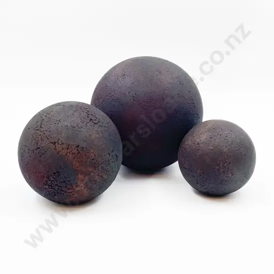 Graduated Set of Three Cannon ball Form Pottery Sculptures