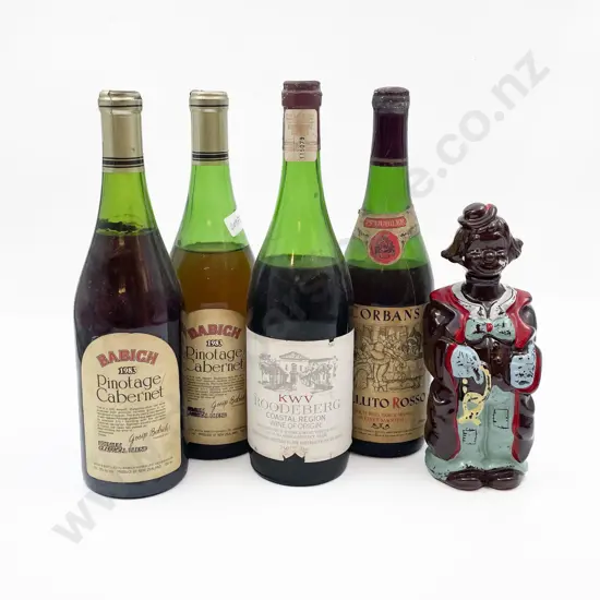 Four Bottles of Assorted Vintage Wine together with Empty Figural Decanter