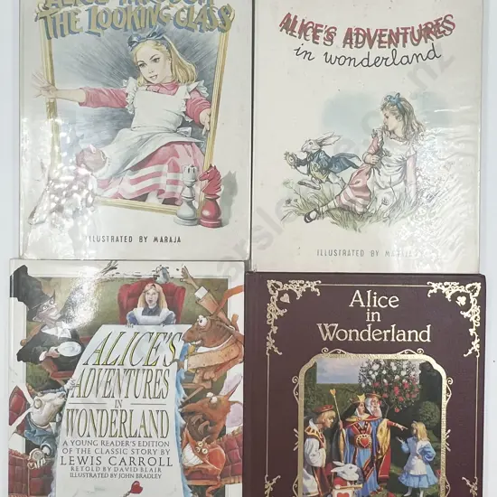 Four Assorted Alice in Wonderland Reference Volumes