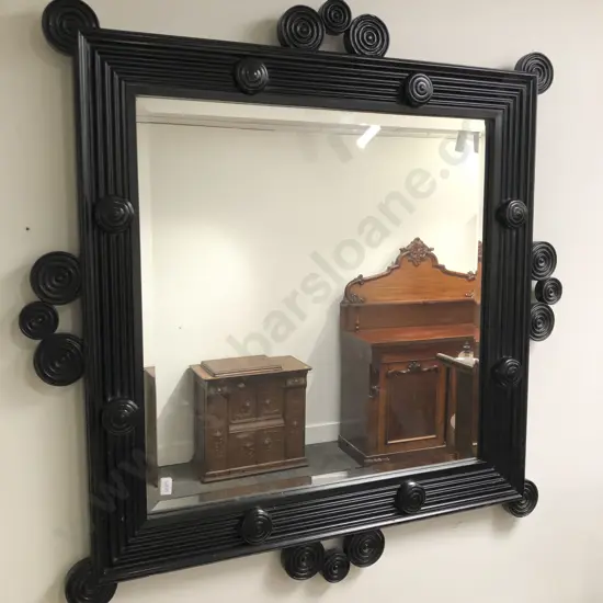 Bevel-edged wall mirror with Decorative Ebonised Frame