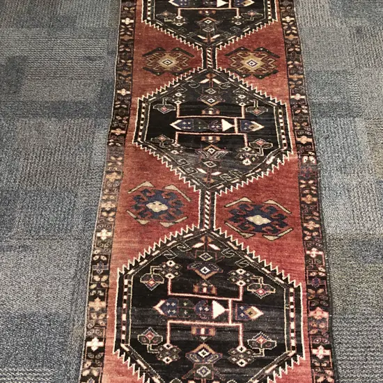 Turkish Woollen Runner with Four Hexagonal Medallions on Faded Red Ground