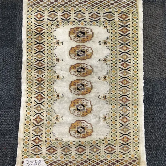 Small Persian Mat with Six Central Gols on Ivory Ground