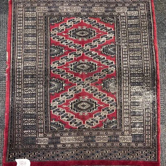 Persian Rug with Three Central Medallions on Red Ground