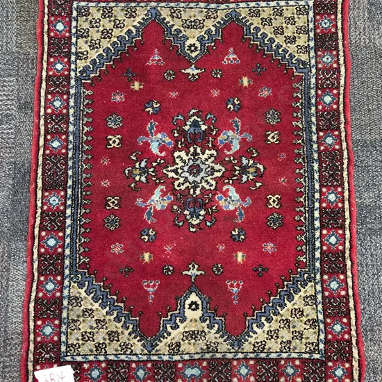 Persian Rug with Floral Centre on Red Ground