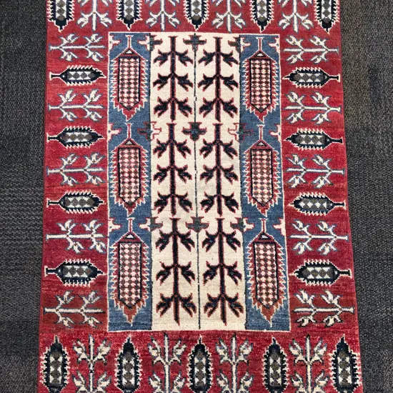 Persian Rug with Four Vertical Central Panels in Red Blue and Ivory Tones