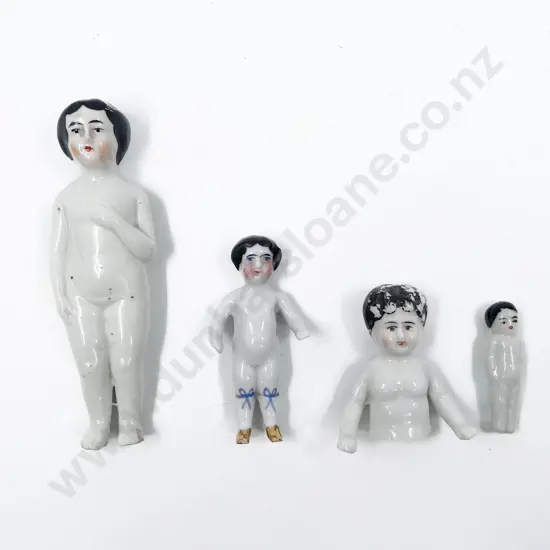Three Victorian China Frozen Charlotte Dolls and Other