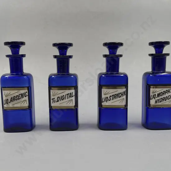 Four Blue Miniature Chemist Jars