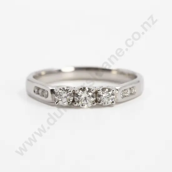 9ct White Gold Three Stone Diamond Bridge Ring