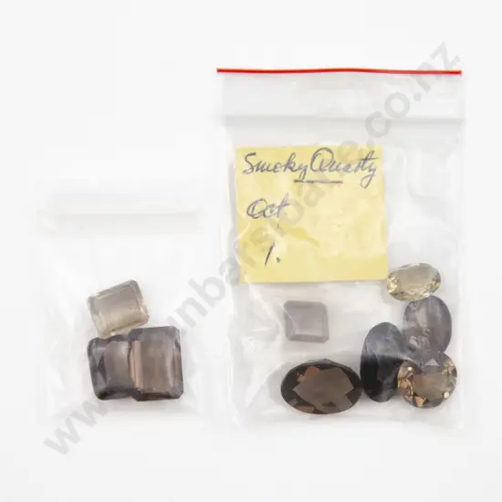 Nine Unmounted Smoky Quartz Gem Stones