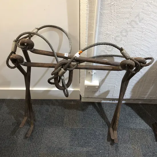 Two Industrial Cast Metal Hoists