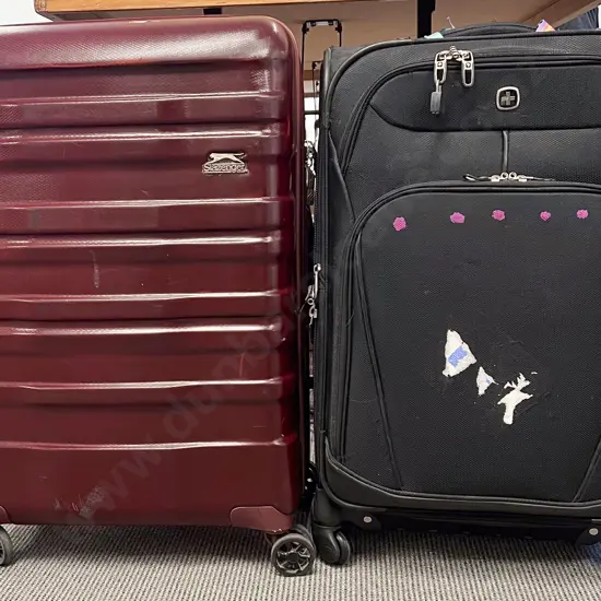 Two Modern Luggage/Suitcases on Wheels