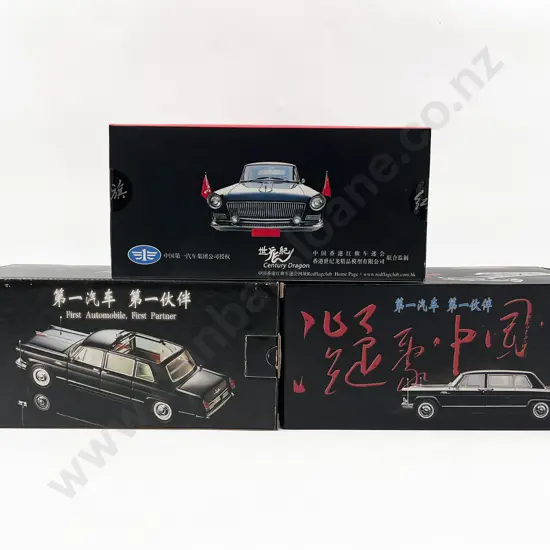 Three Boxed Model Cars