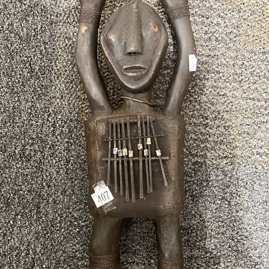 Tribal Carved Musical Figure