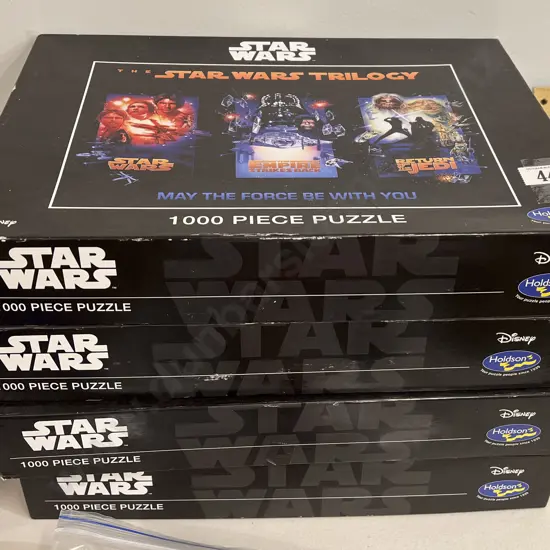 Four Assorted Star Wars Puzzles