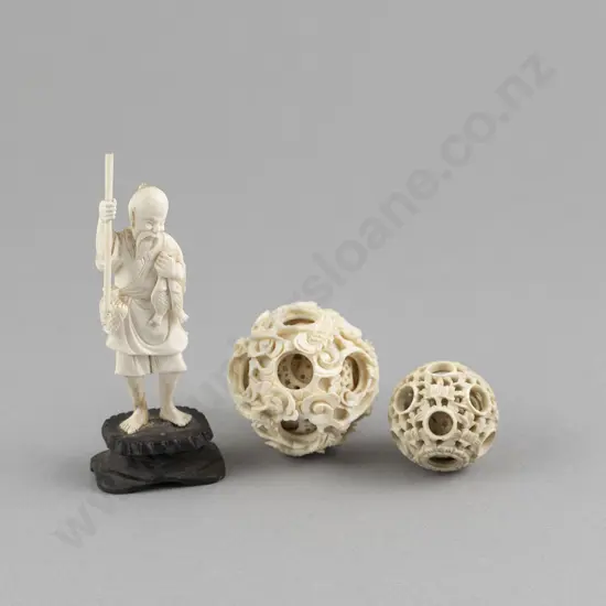 Two Carved Ivory Puzzle Balls