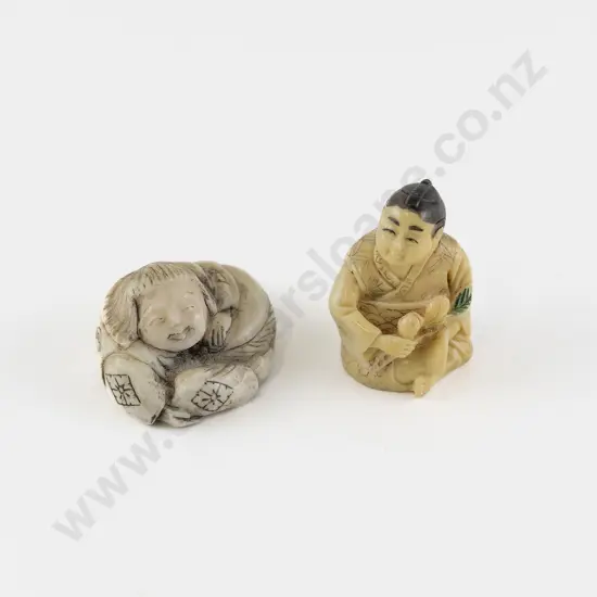 Two Composition Netsuke of Child Resting on a Drum
