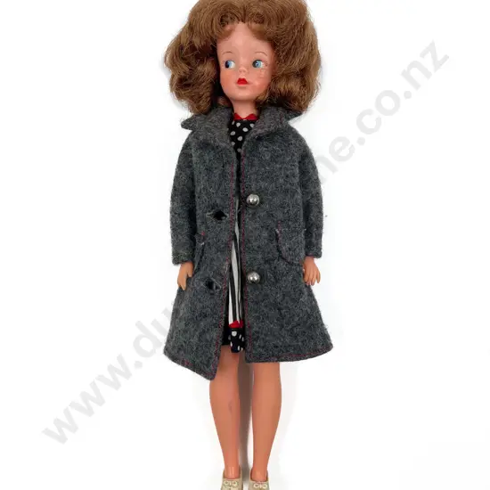 Early 1960's Pedigree Sindy wearing un-labeled dress and coat