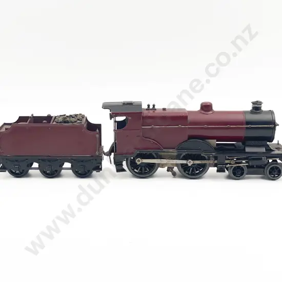 Unidentified O Gauge Clockwork Locomotive and 6-wheel Tender