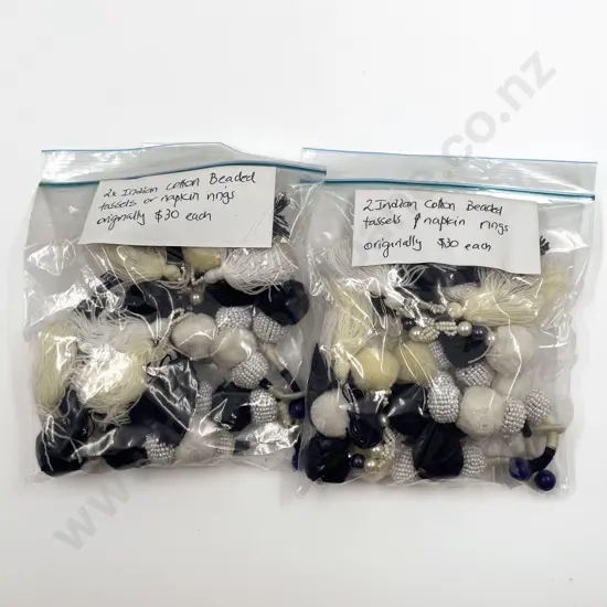 Four Indian Cotton and Beaded Tassels & Napkin Rings