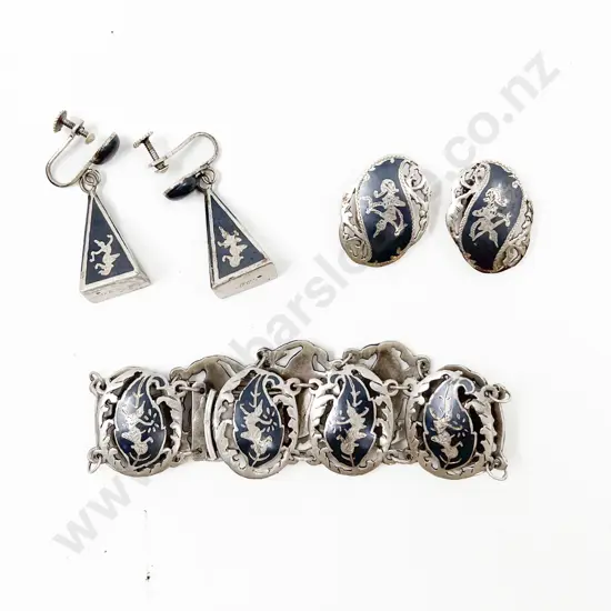 Small Silver Bracelet Together with Matching Earrings