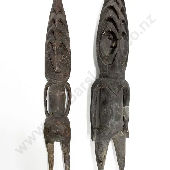 Two Standing Romkun Figures