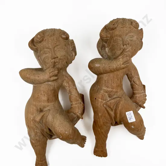 Pair of Carved Cherub Wall Hangings